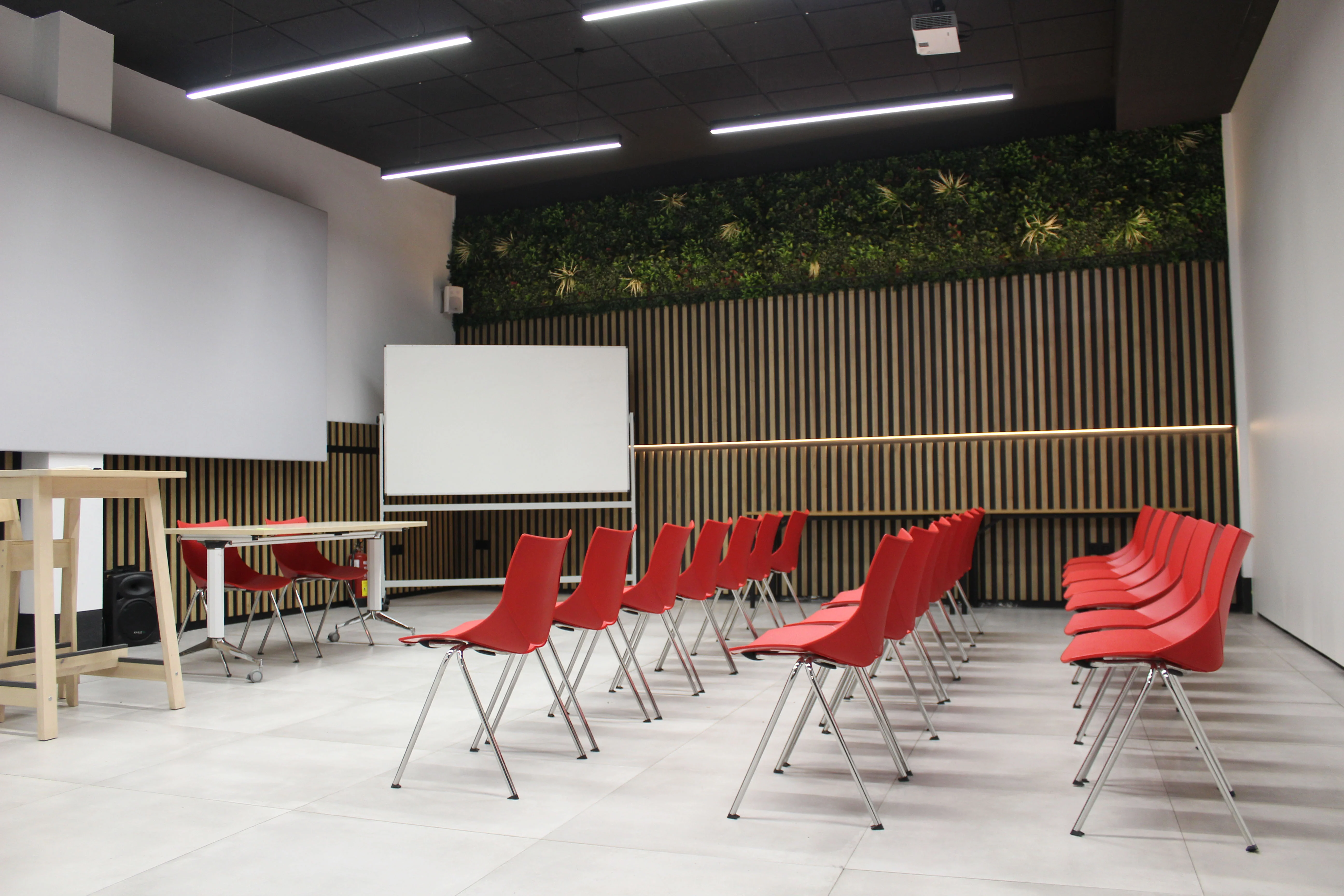 Boardroom layout with projector and whiteboard